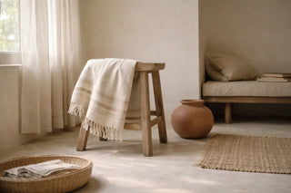 Artisan hands weaving handmade textile on traditional loom, showcasing slow craftsmanship and sustainable practices