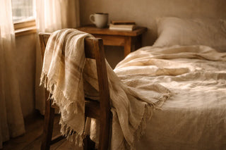 Simple handwoven cotton textile draped casually, representing the everyday practicality and timeless quality of Indian handloom beyond festive occasions