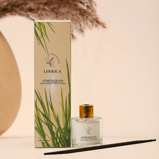 Lerrièca Lemongrass perfume bottle and packaging with decorative elements on a neutral background