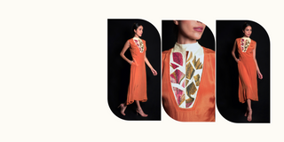 Woman wearing an orange dress with a floral pattern on a white background